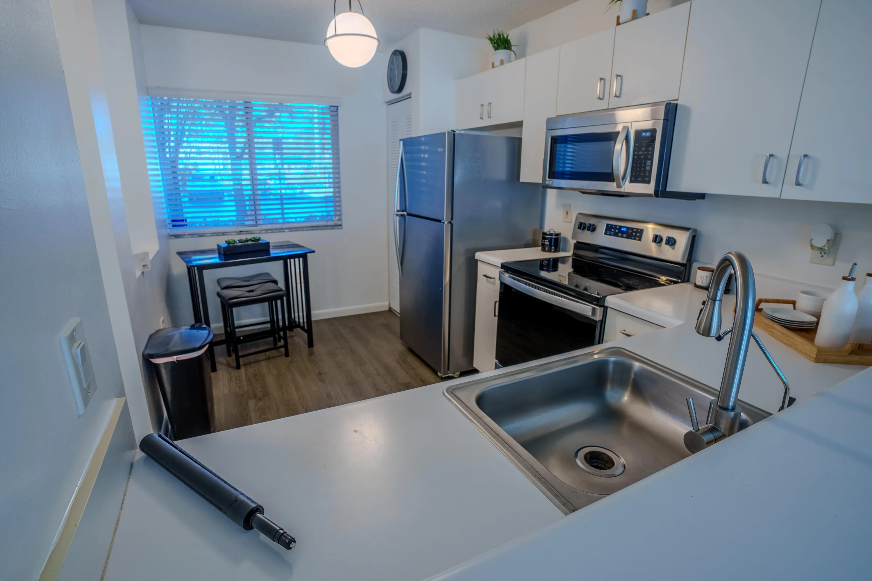 New stainless steel faucet with sprayer, breakfast area and pantry
