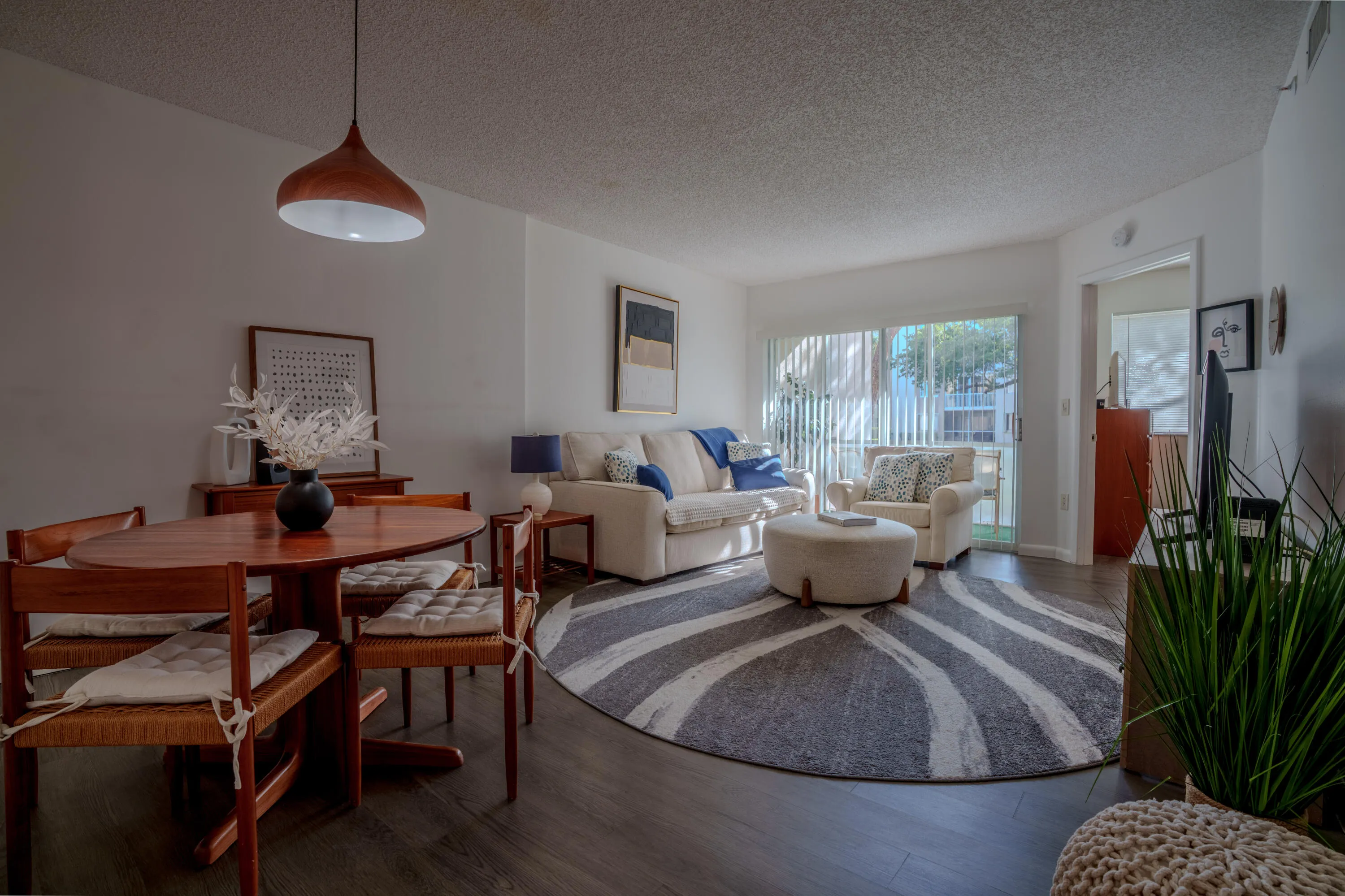 Open concept living area with wood luxury vinyl floors