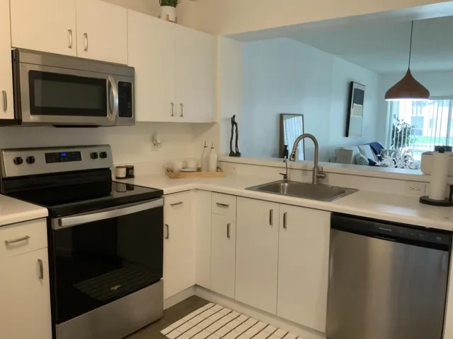 View of lighted fountain from kitchen sink
