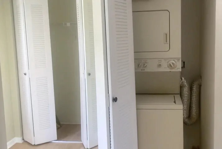 Washer and dryer in unit! entry broom closet to left
