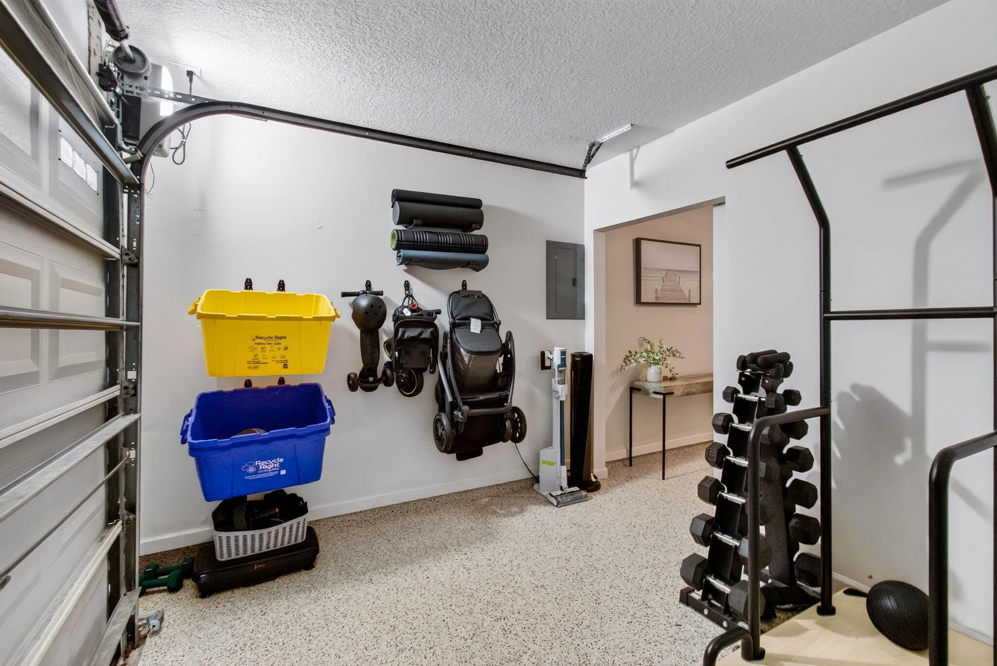 Garage with speckled epoxy flooring