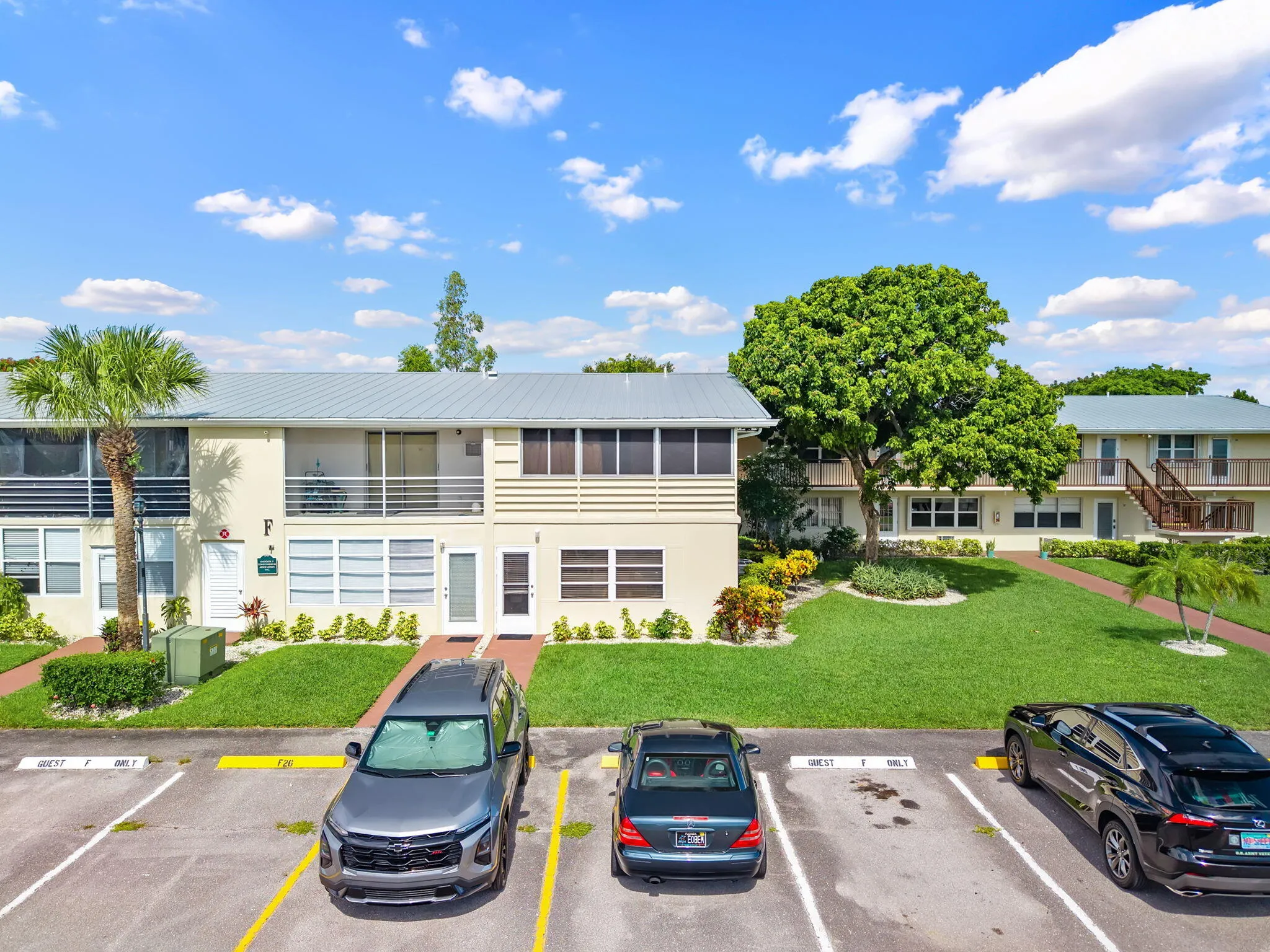 Back Door of Unit with Parking