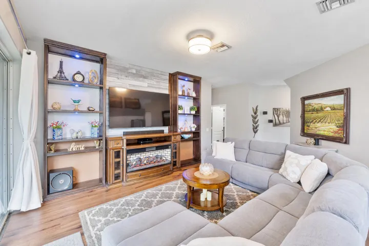 LIVING ROOM BUILT-IN WITH ELECTRIC FIRE PLACE