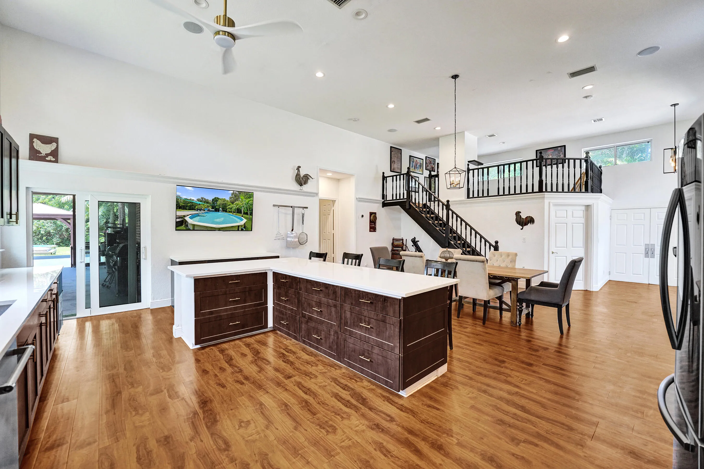 Large island with quartz and tons of cabinets for storage
