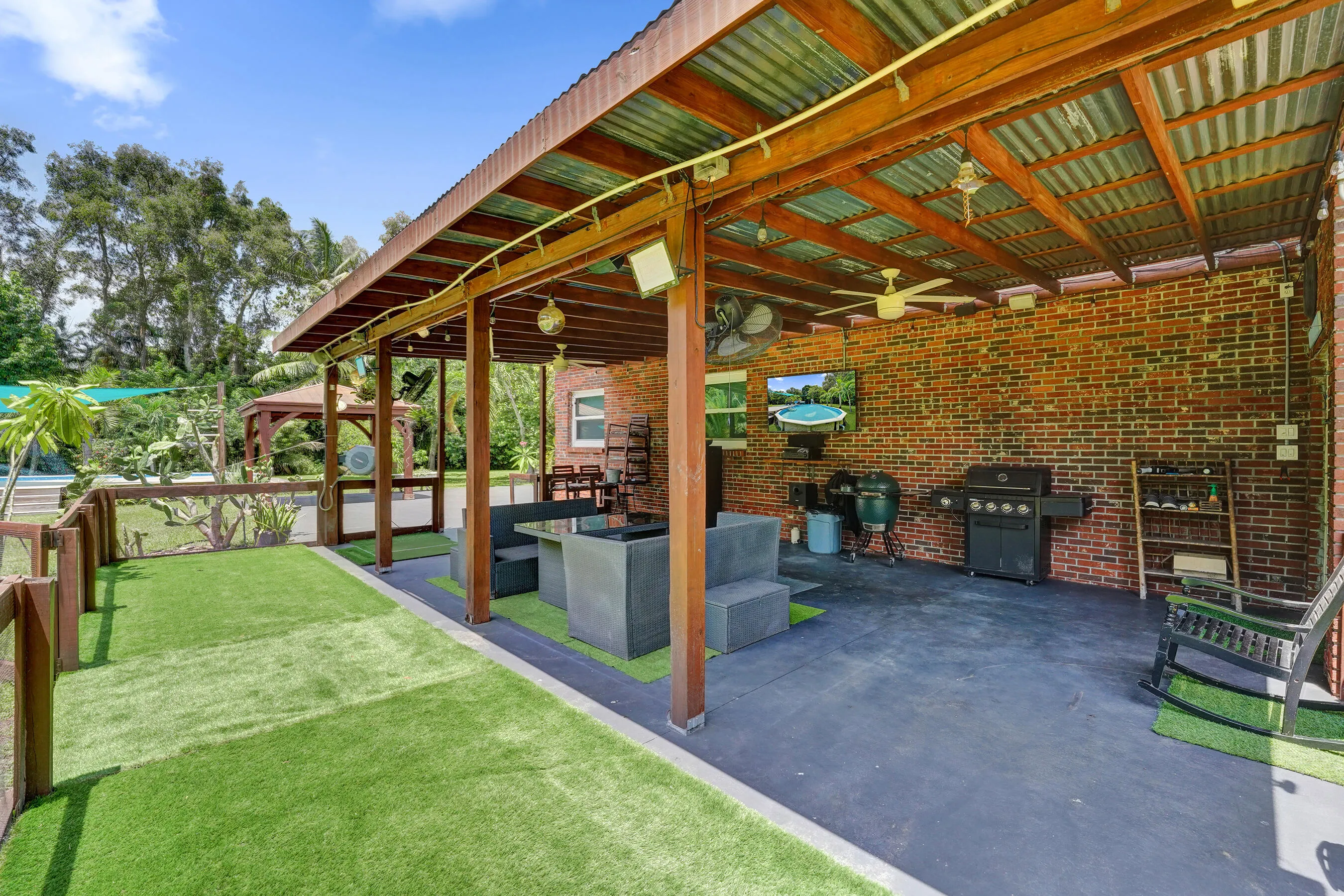 Covered side patio with turf!