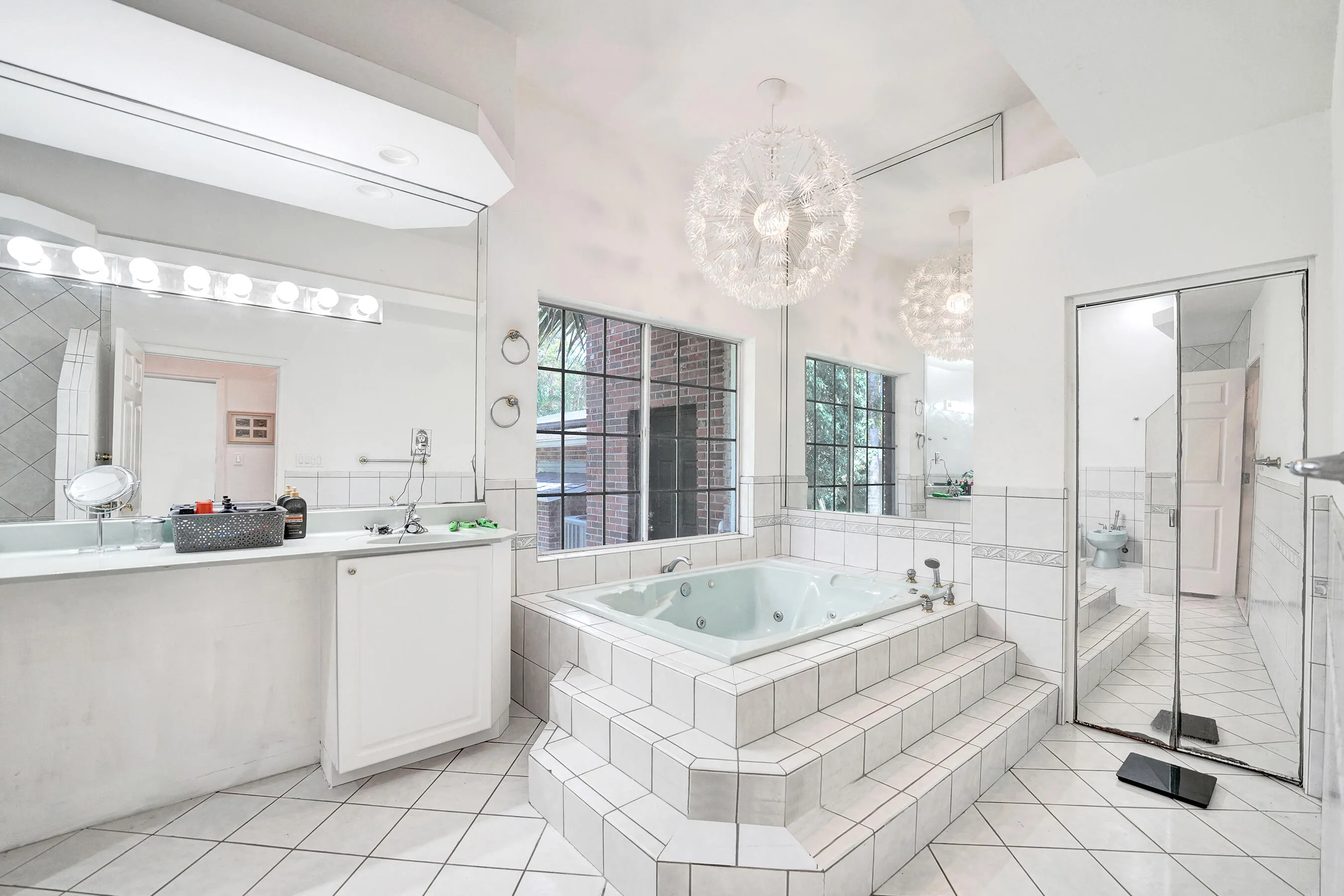 Original master bath is huge but could use a nice update... see next pics for a staged bathroom to show its true potential