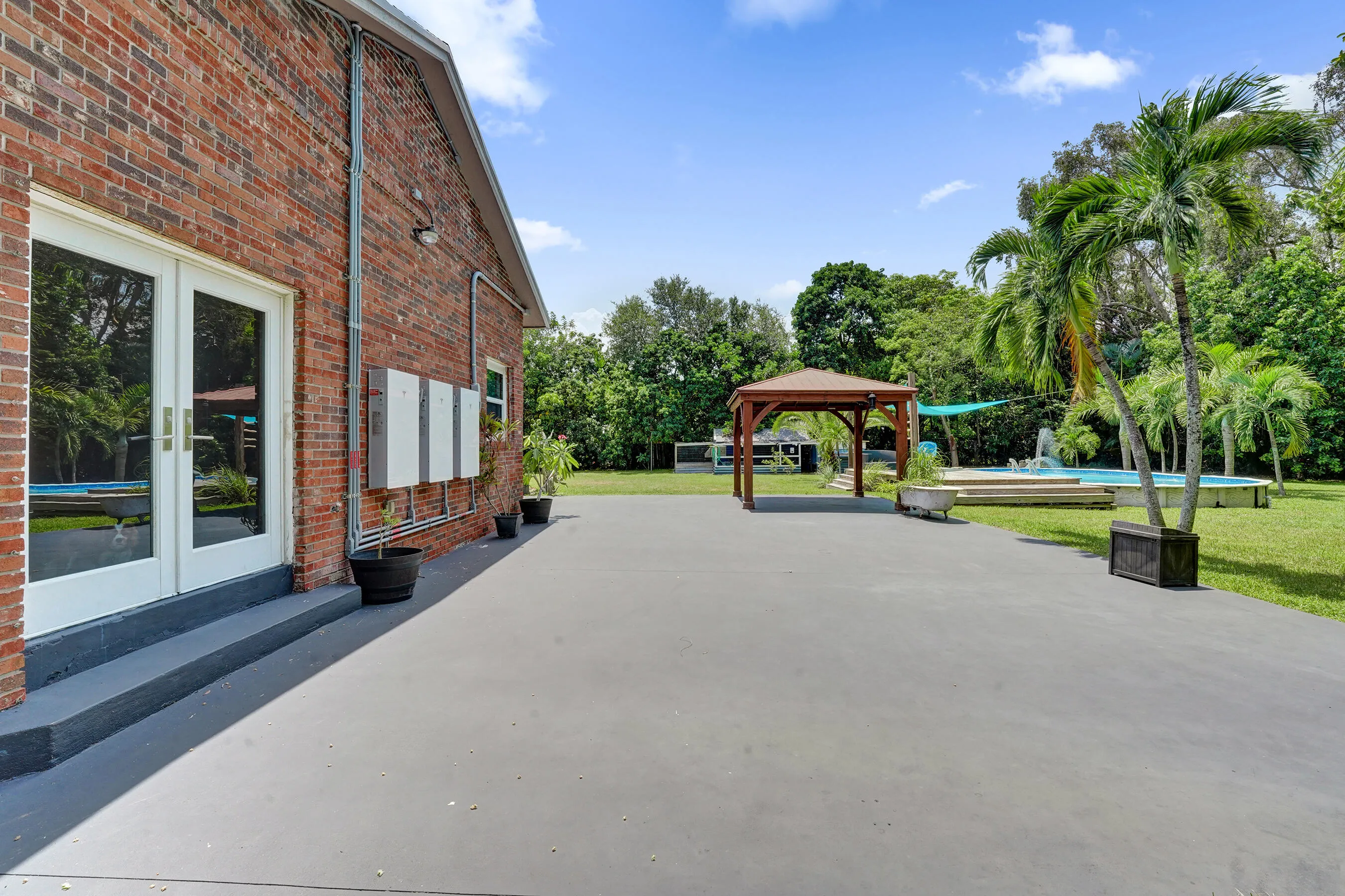 French doors off the primary suite lead to back patio