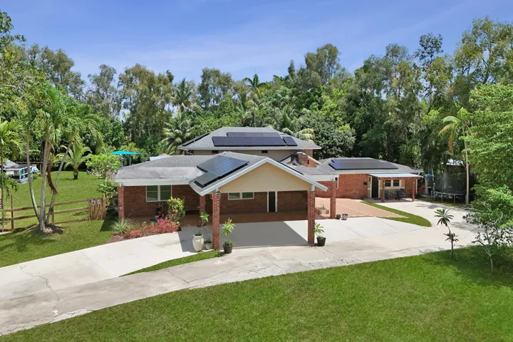 Nearly 2 acre estate with Main house, and 2 guest houses with private secluded entrance with NO HOA!