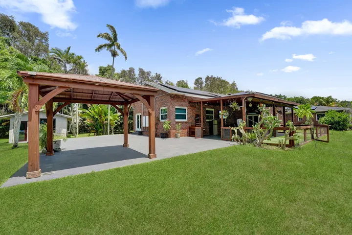 Covered pergola near pool area