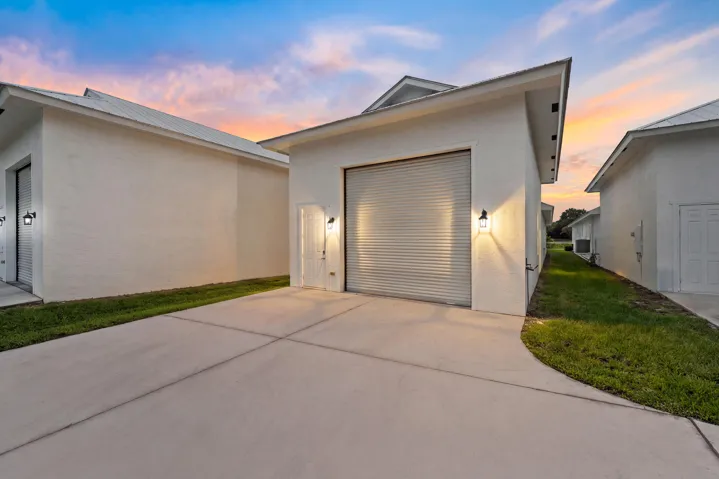 Back of home, attached 4 car garage