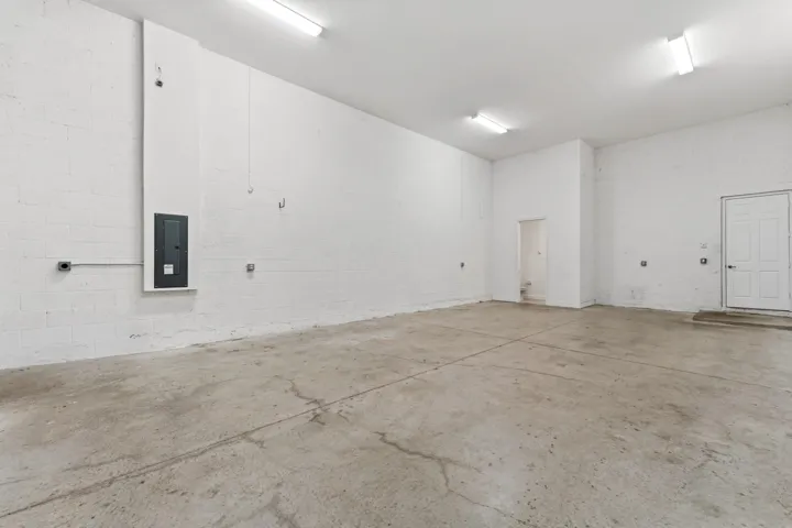 Garage can fit 4 cars, a boat, or RV