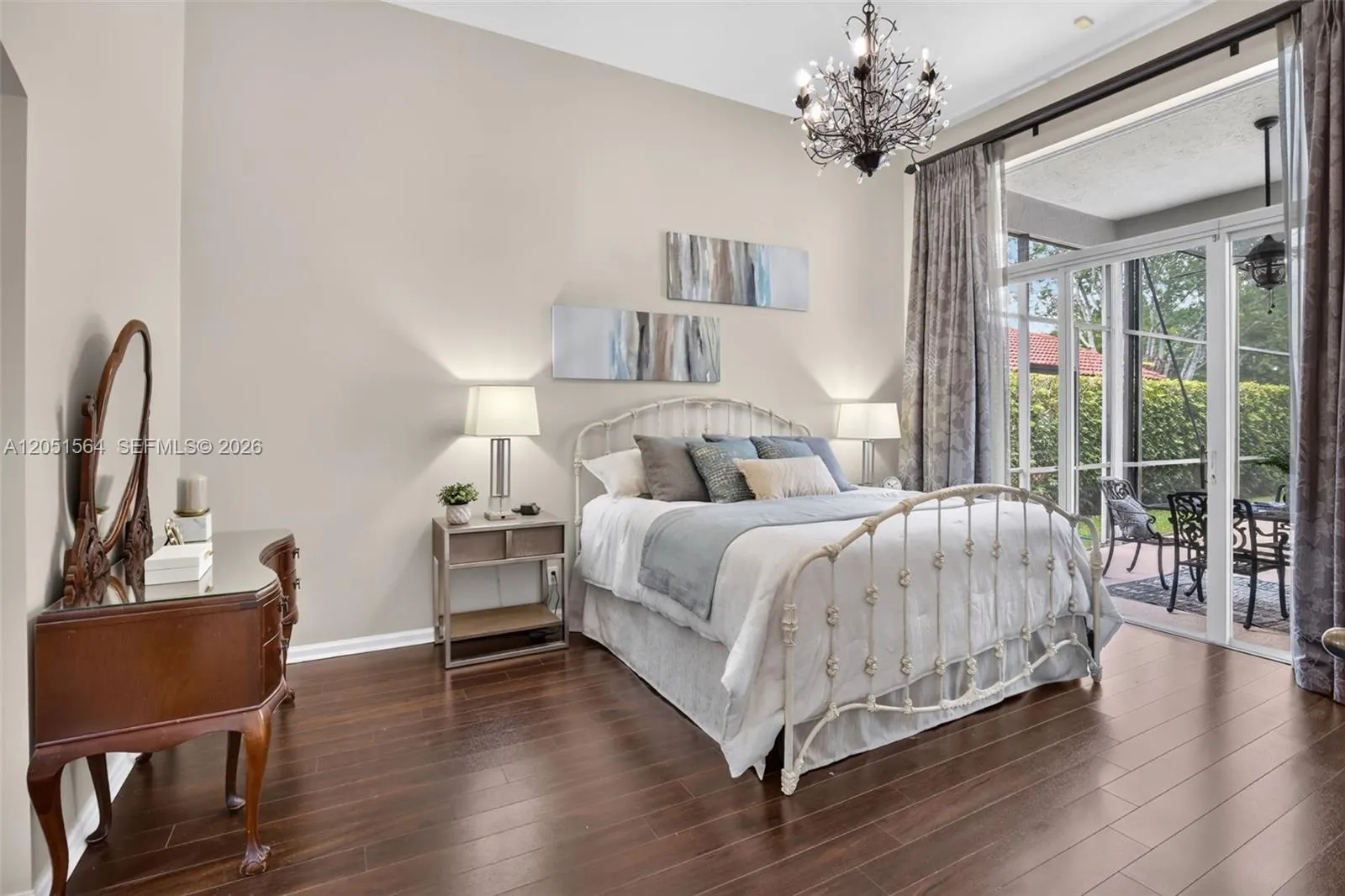 Master bedroom overlooking the pool and lake.