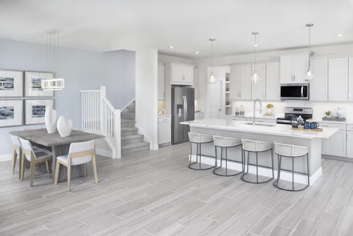 Stock photos represent builder's floorplan