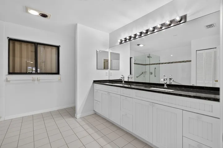Renovated and just painted Master Bath. Shutters closed, sorry.