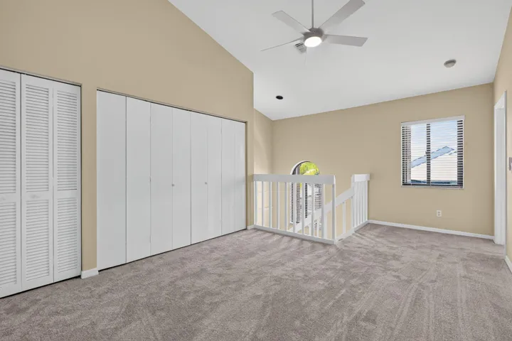 HUGE loft with new carpet, paint and fan.