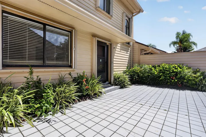 Front door. Note the FULL accordion shutter coverage.