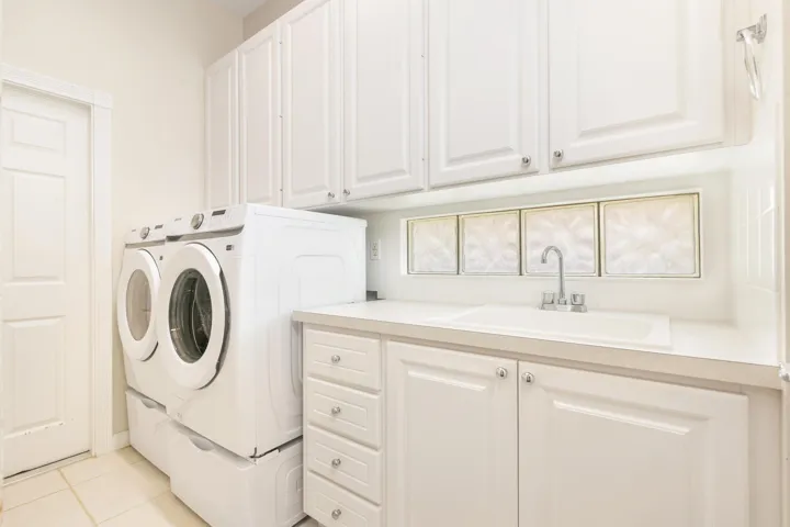Spacious Laundry room front loaders, tub sink