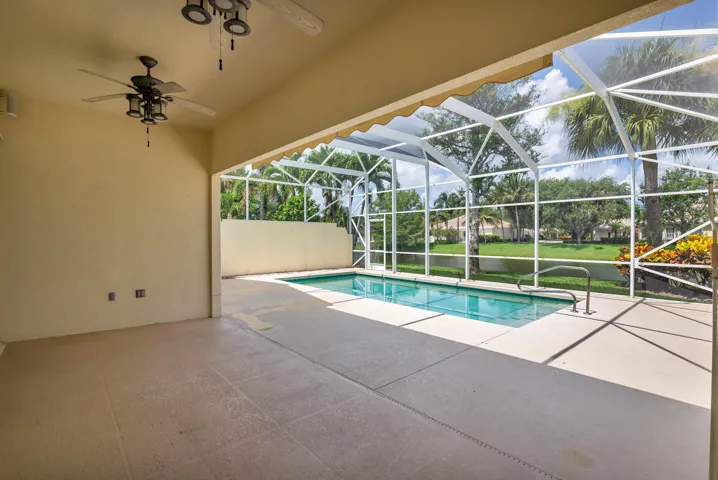 covered screen-in patio w/fans