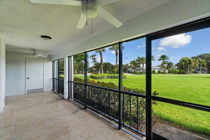 Screened lanai overlooking the Turtle Creek golf course