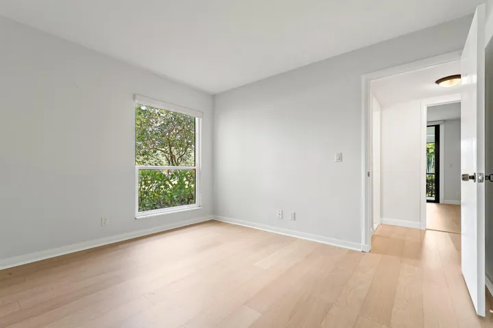 Second bedroom filled with bright, natural light