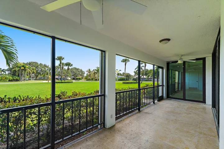 Covered patio built for easy Florida mornings on the green