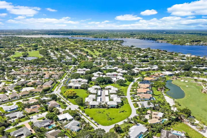 Rolling fairways and lakes wrap the neighborhood