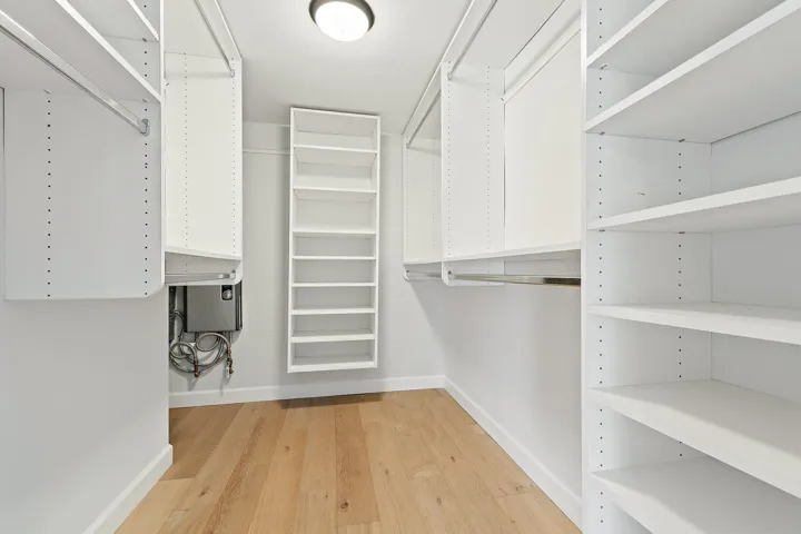 Custom walk-in closet with built-in shelving