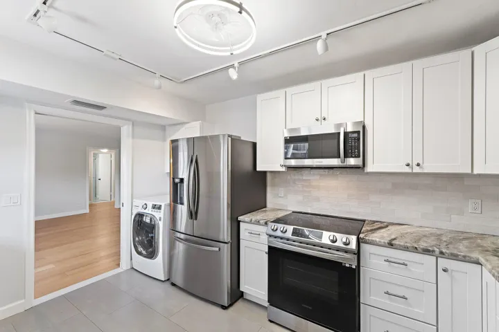 LG washer and dryer sit just off the kitchen