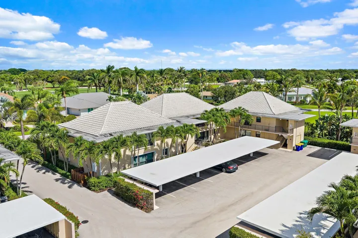Low-density buildings with covered parking and tile roofs