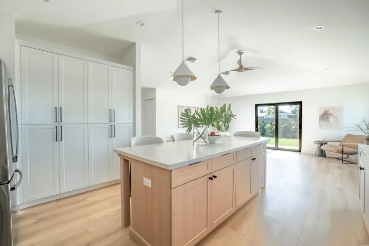 Kitchen island and storage pantry