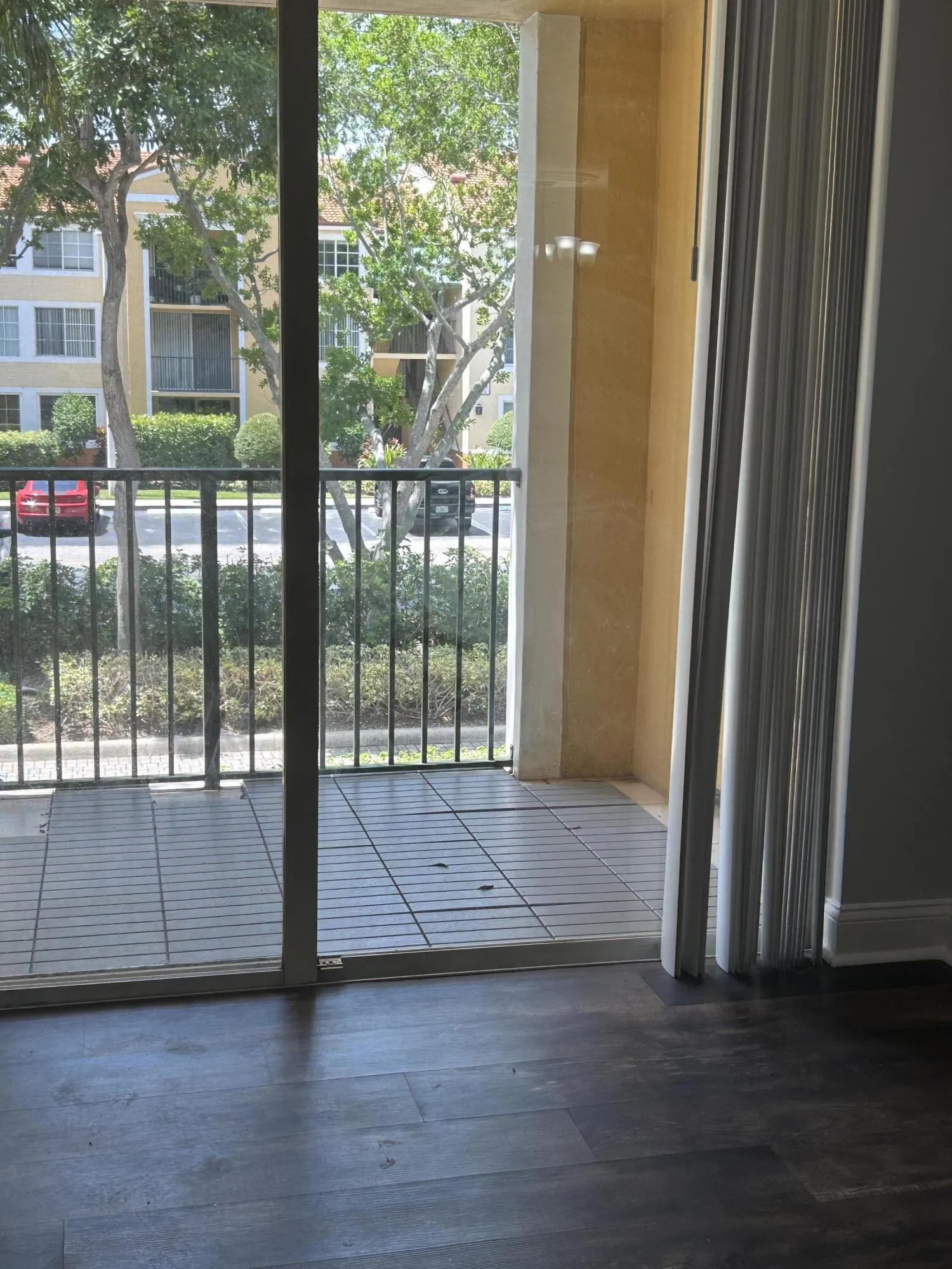 Sliding glass door leading to a private balcony