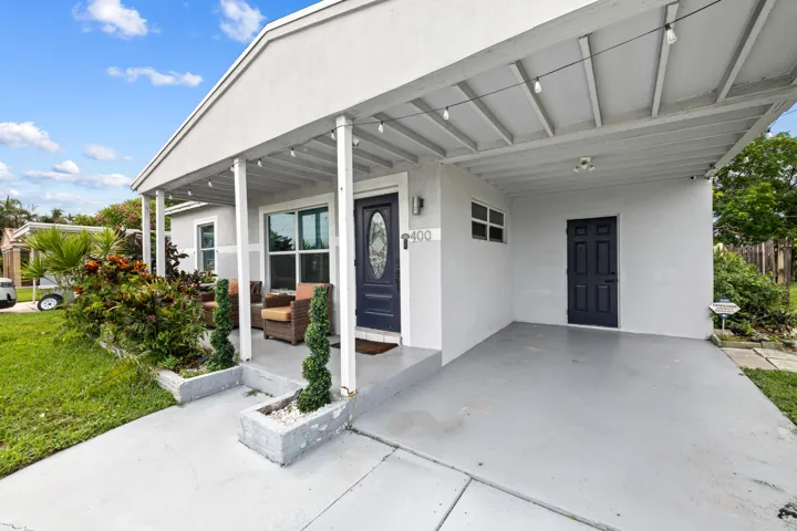 Laundry room entrance from carport