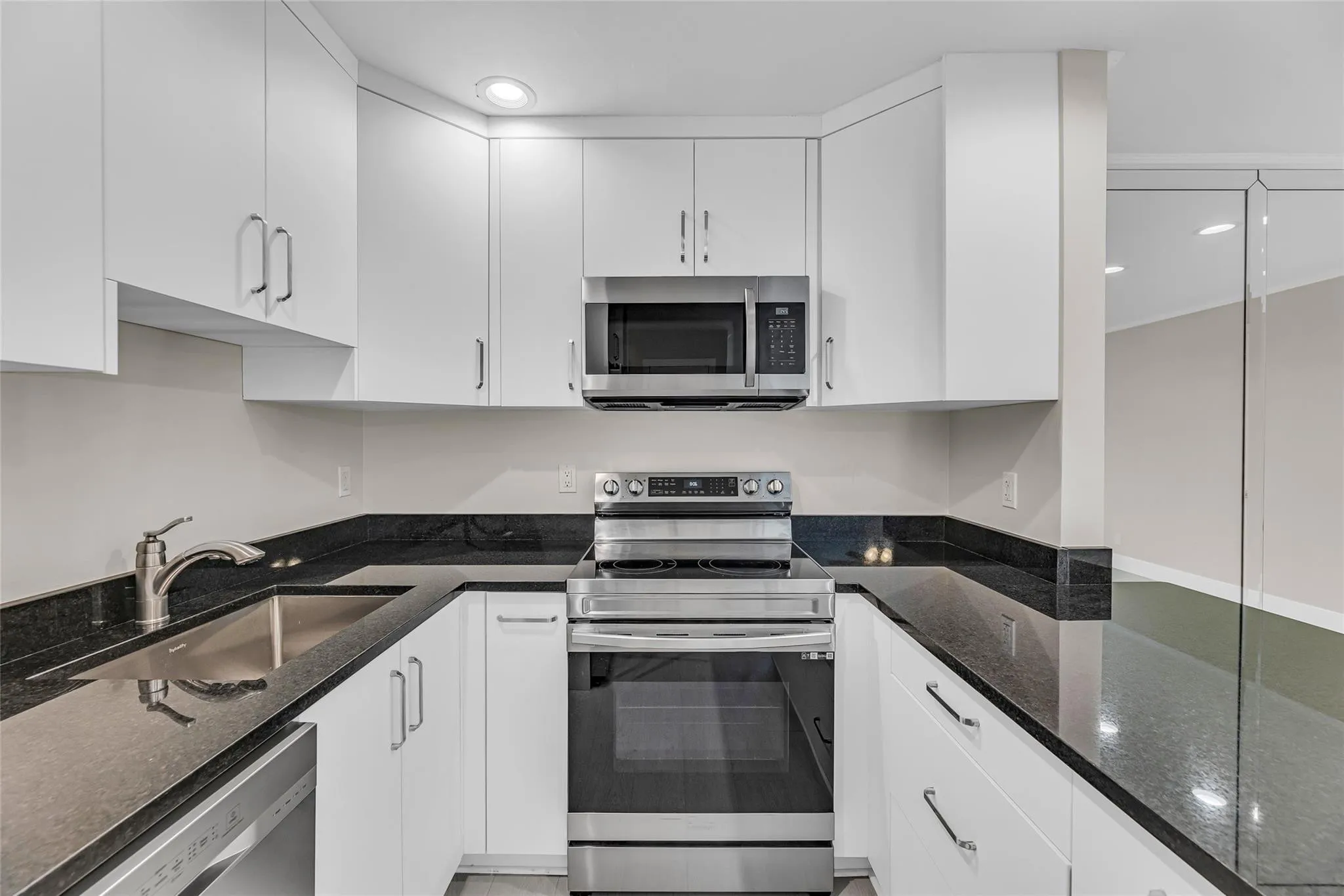 Custom cabinets and stainless steel appliances