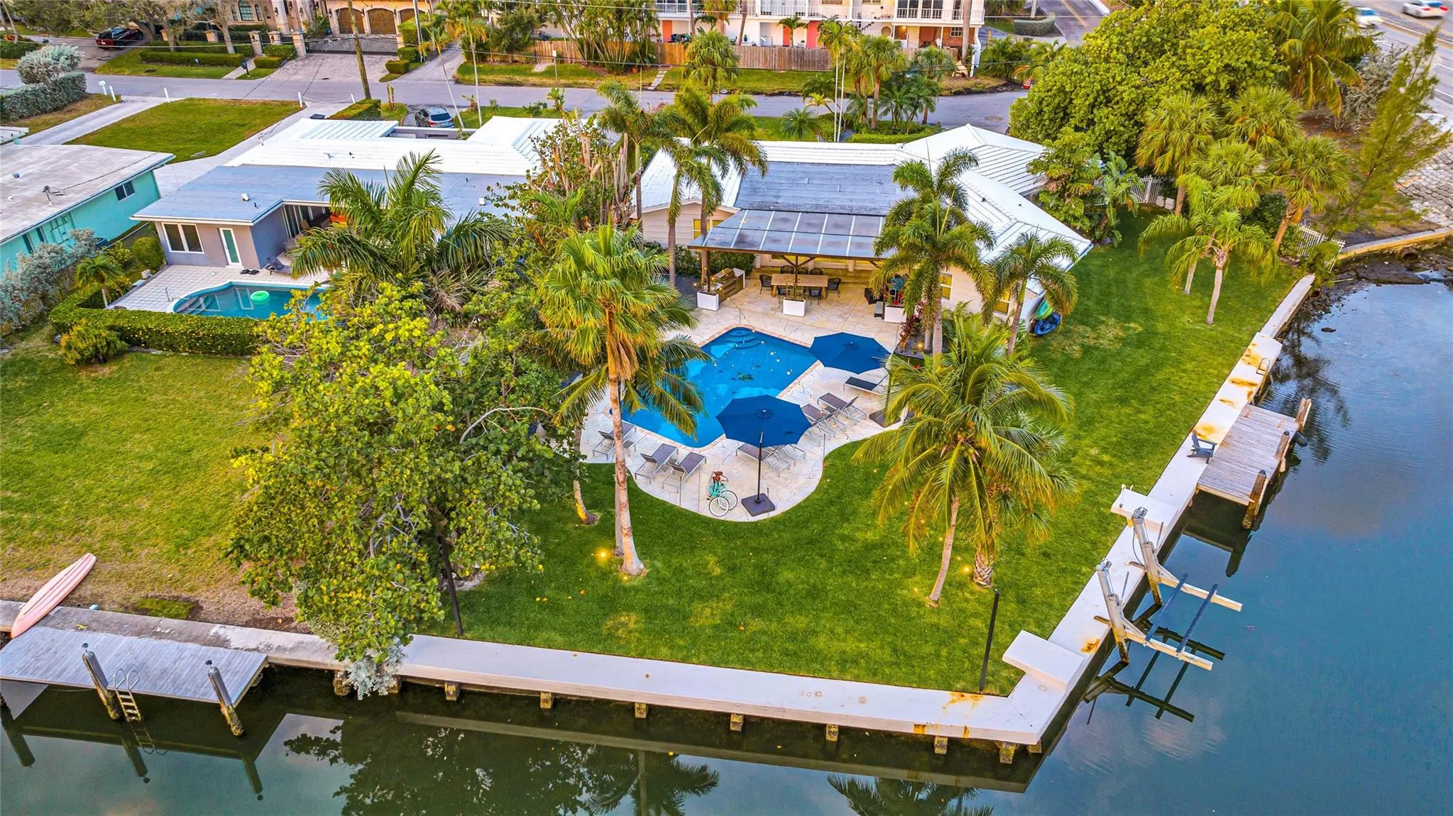 134-feet of waterfront on oversized 1/3-acre interior point lot, Breathtaking waterway views (day and night), boat lift with ocean access 5 mins to the inlet!