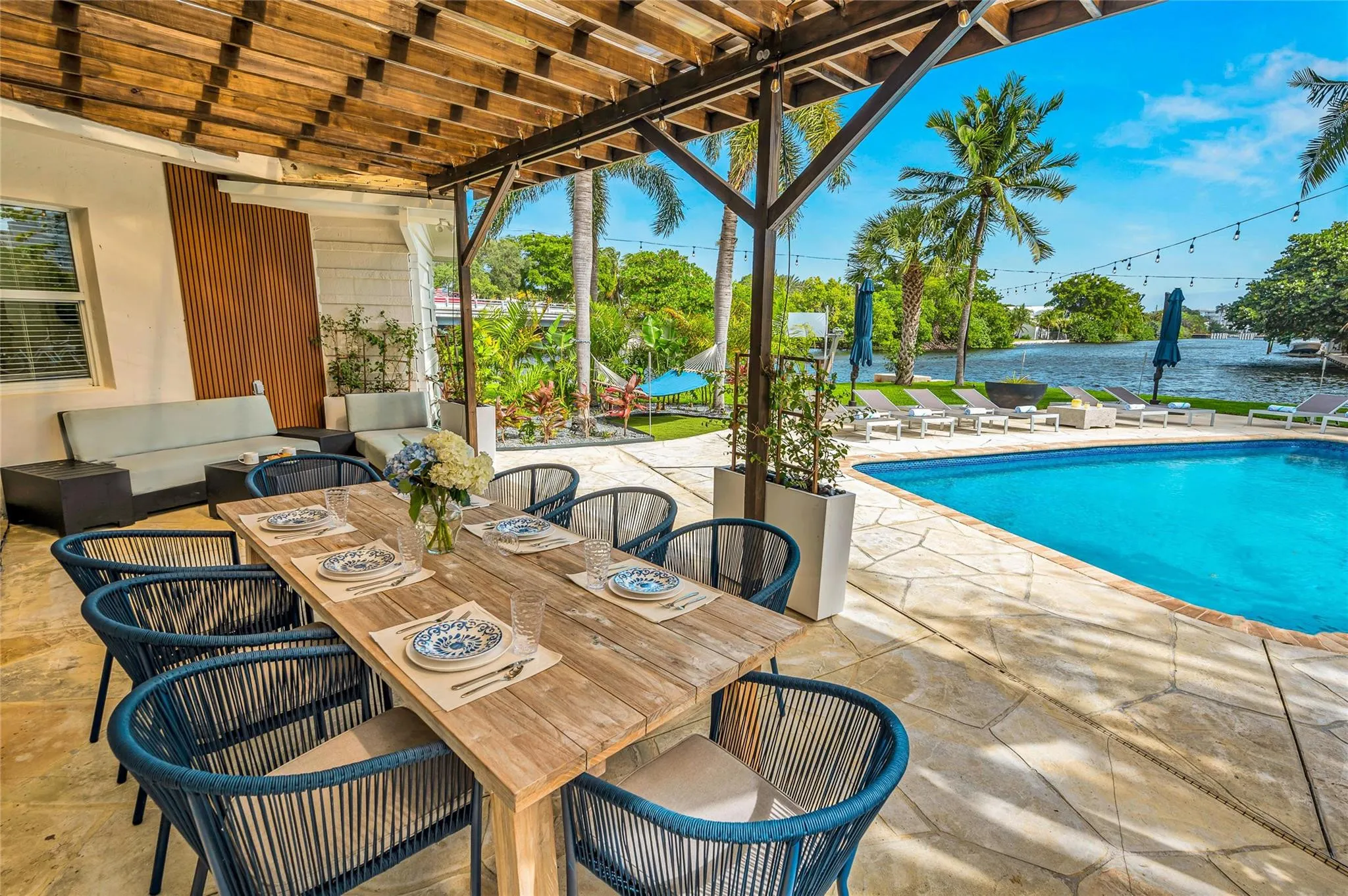 15x30 covered patio space, Natural gas Grill space with prep area on each side, Electric outlets and lighting.