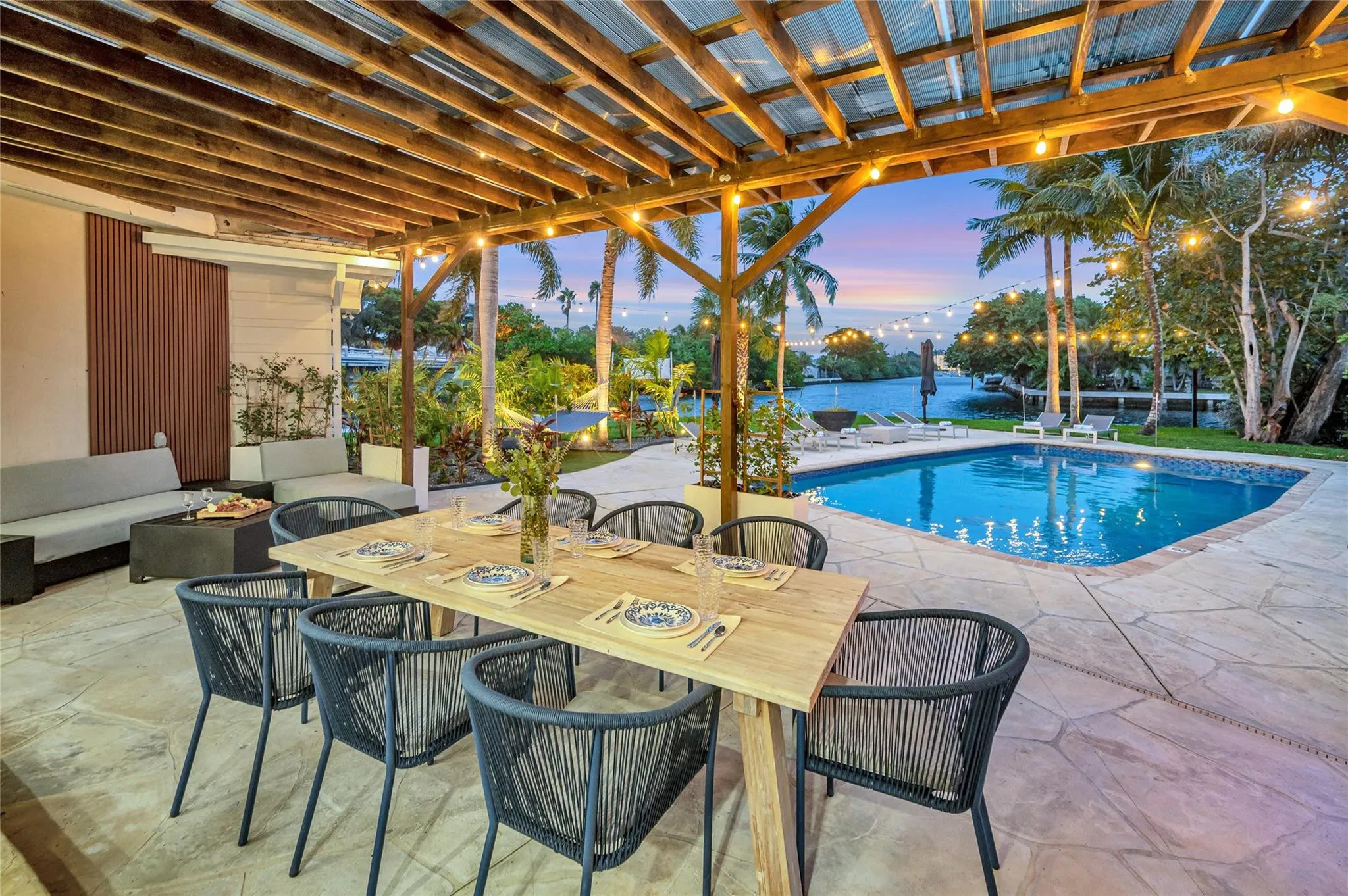 15x30 covered patio space, Natural gas Grill space with prep area on each side, Electric outlets and lighting.