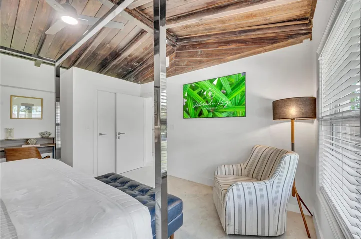 Guest bedroom #2 features vaulted ceiling 2 walk in closets, ceiling fan, and tons of natural light!
