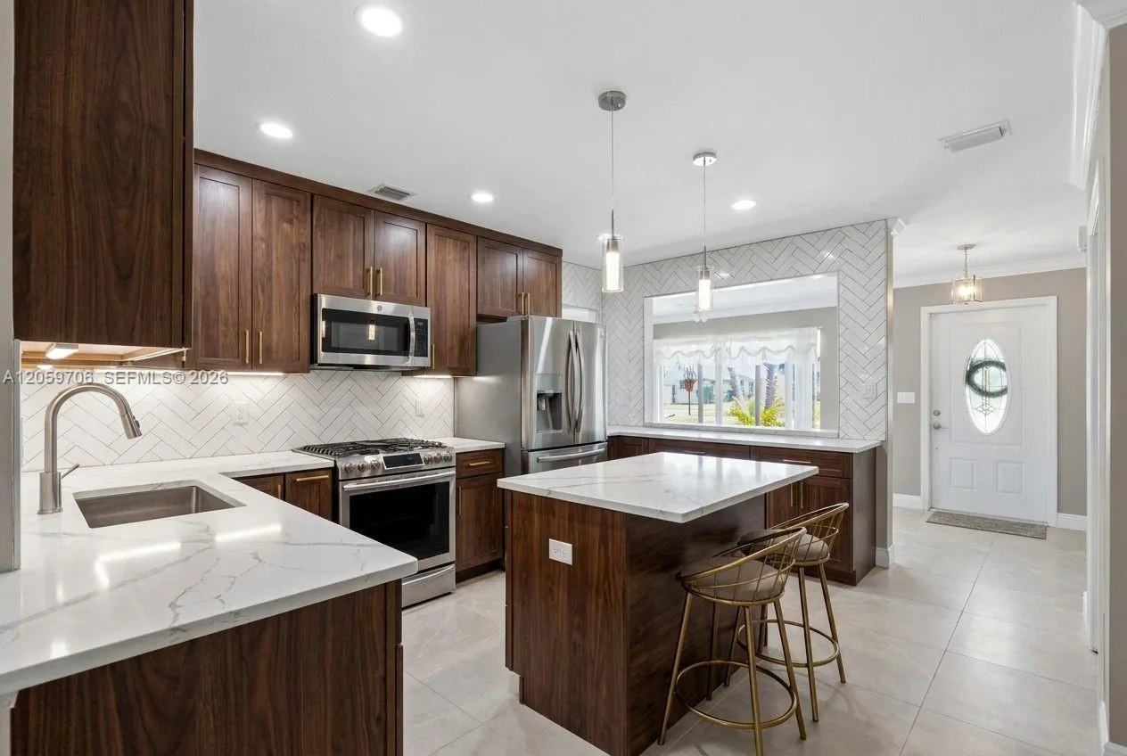 Kitchen image has been digitally enhanced to illustrate the property's renovation potential.
