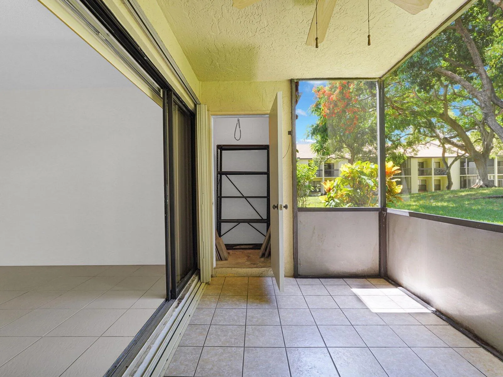 Screened in Patio with Storage