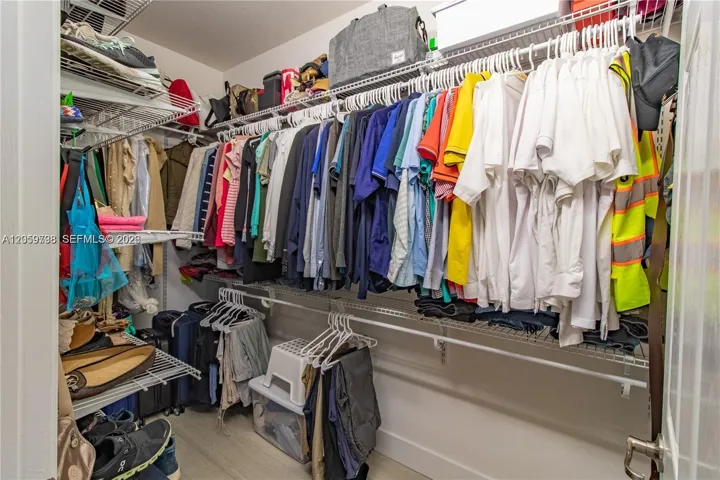 Walk-in closet primary bedroom