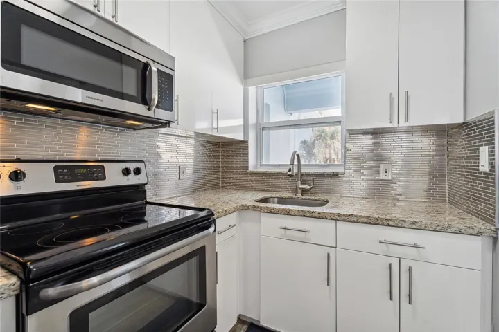 Granite kitchen with stainless appliances