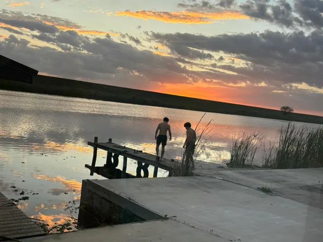 Lake view and boat dock, with beautiful sunset view.