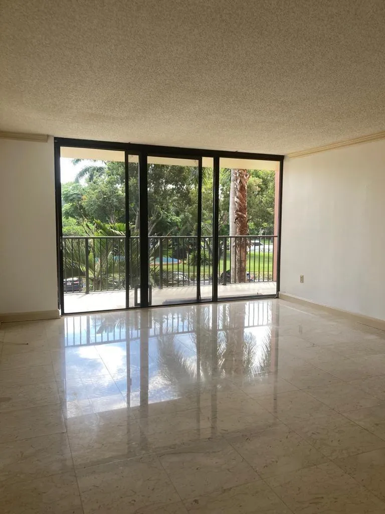 Expansive sliding glass doors provide abundant natural light