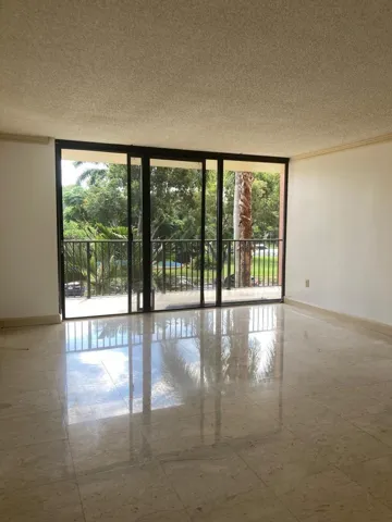 Expansive sliding glass doors provide abundant natural light