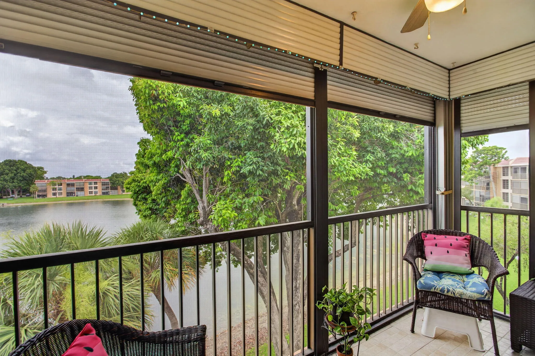 The sun basks and cool breezes are captured on your balcony. Convenient Rolladen shutters. Serene lake views.