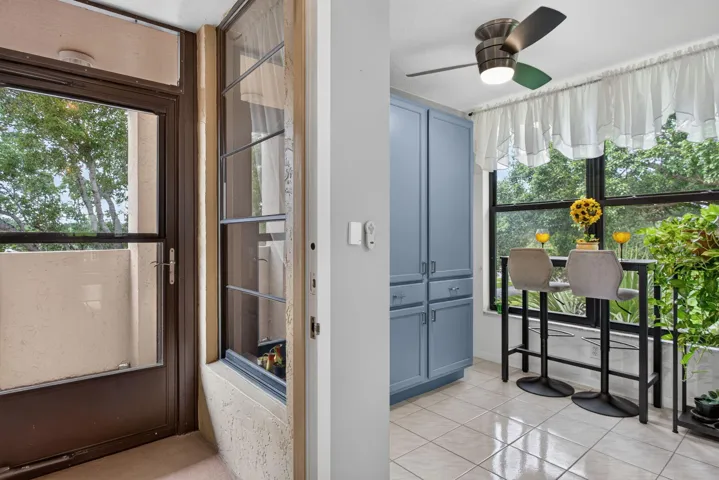 Savor morning coffee at the breakfast bar with two stools to watch endless sunrises. Storm door with screen option.
