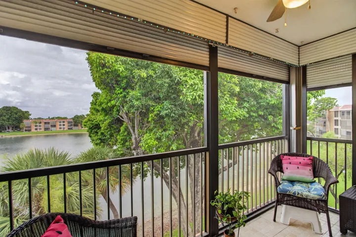 The sun basks and cool breezes are captured on your balcony. Convenient Rolladen shutters. Serene lake views.