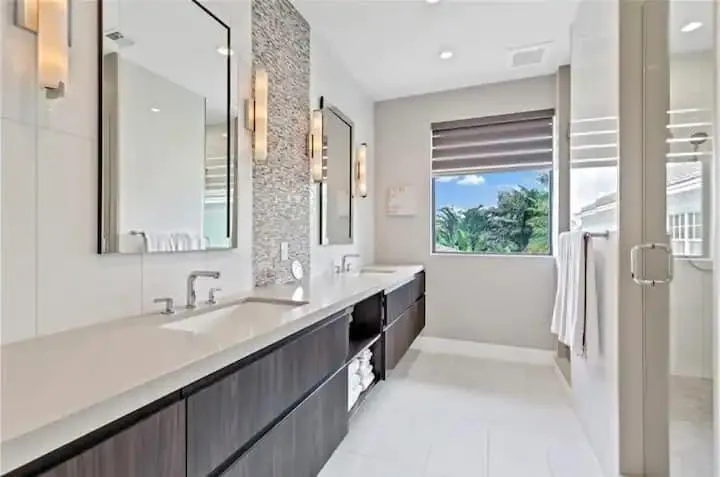 En Suite Primary Bathroom #1 with Double Sink & Shower.