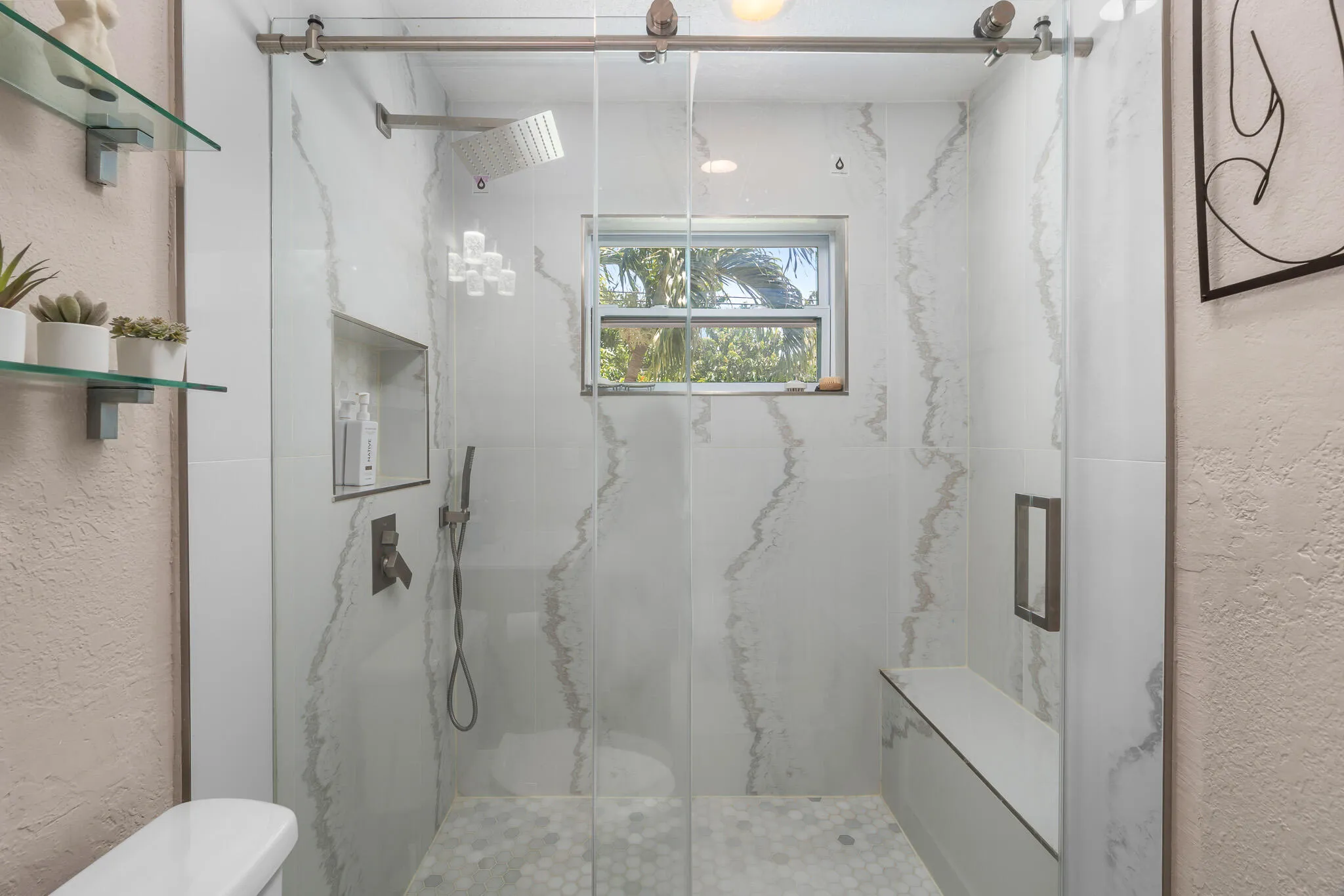 luxurious shower with glass doors