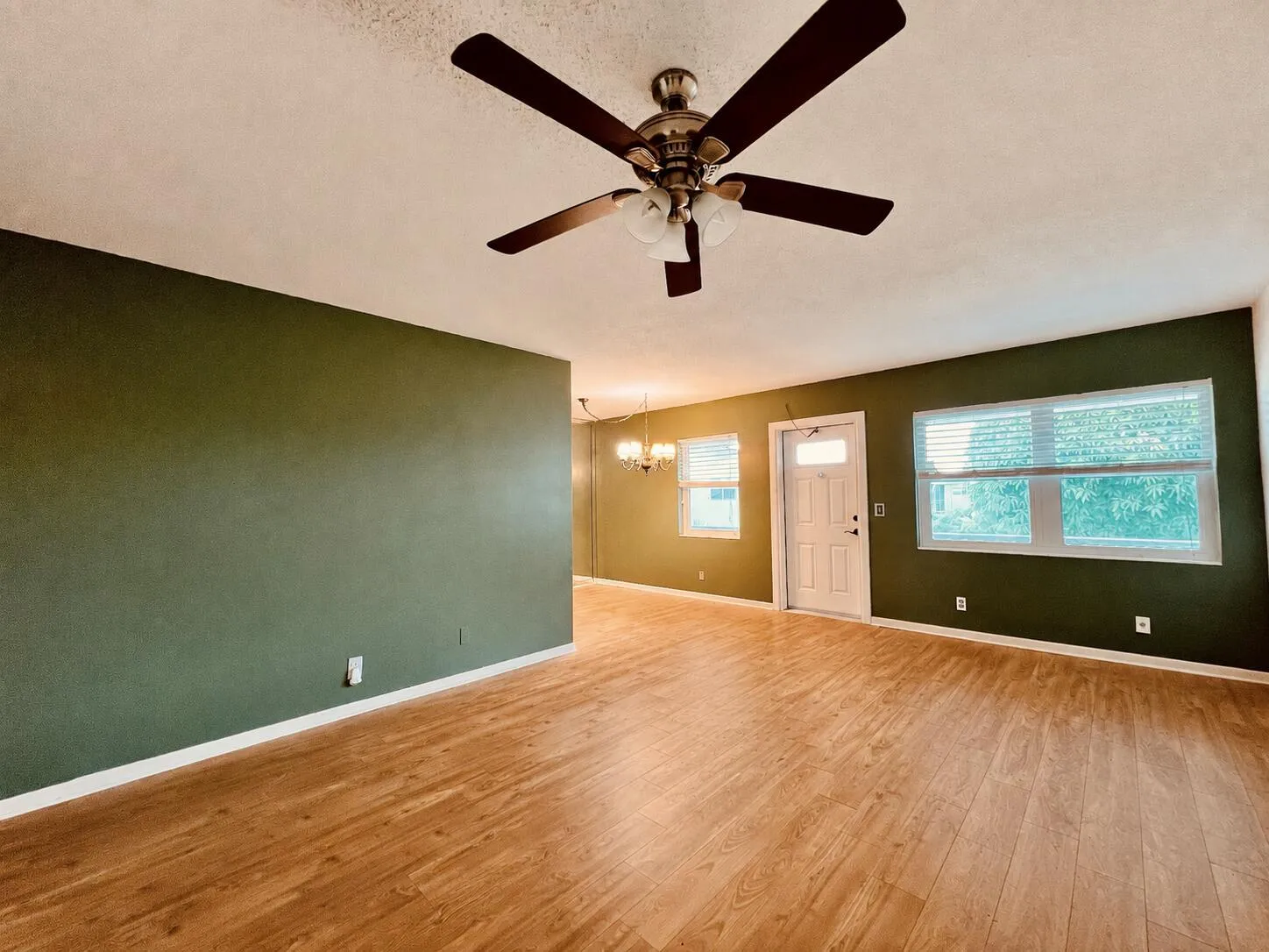 Wonderful Updates in this 2/1! Impact Windows! Updated Front Door! Gleaming Wood Look Flooring!